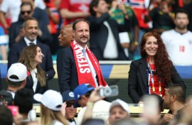 Lise Klaveness (R) says the idea of a 64-team World Cup is unreasonable