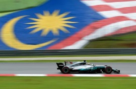 Lewis Hamilton races at the 2017 Malaysian Grand Prix while driving for Mercedes