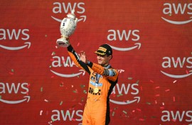 Lando Norris celebrates his first grand prix win of the season in Hungary