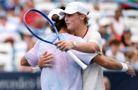 Alex de Minaur gave fellow Australian Cruz Hewitt a warm embrace following their match in Washington DC