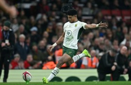 South Africa fly-half Sacha Feinberg-Mngomezulu kicks a conversion in a 2025 Test against England in London.