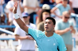 American Brandon Nakashima celebrates after defeating top-seeded defending champion Alex de Minaur of Australia in the Washington Open quarter-finals