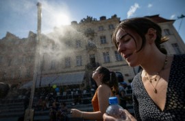 European authorities issued health warnings, battled wildfires and urged people to avoid outdoor activities during afternoons