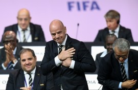 FIFA President Gianni Infantino (C) faces mounting problems after UEFA threatened legal action over his shelved plan