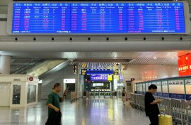 Airports in China cancelled flights and some train services had been affected as China's eastern coast prepared for Typhoon Dolphin