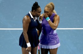 Sisters Venus Williams, left, and Serena Williams, 14-time Grand Slam doubles champions who had not played together competitively in four years, lost in their first match at the WTA and ATP Cincinnati Masters