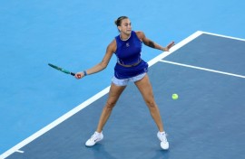 World number one Aryna Sabalenka returns a shot in a victory over China's Wang Xinyu at the WTA and ATP Cincinnati Masters