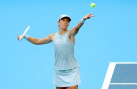 Iga Swiatek of Poland reached the semi-finals of the Cincinnati event after her opponent retired with a heel injury