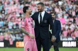Lionel Messi (L) and David Beckham