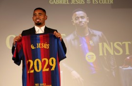 Brazilian forward Gabriel Jesus poses with his jersey during his official presentation at Barcelona