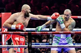 Tyson Fury (left) has challenged Oleksandr Usyk to a third fight