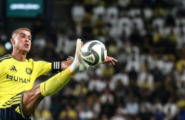Cristiano Ronaldo controls the ball during a Saudi Pro League football match