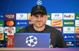 Liverpool midfielder Alexis Mac Allister attends a press conference on the eve of a Champions League first-round match at home to Atletico Madrid