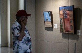 Several of former US president George W. Bush's 9/11-related art works feature images of the American flag, including one of the Stars and Stripes unfurled at the Pentagon after the 2001 attacks