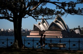 People run past the Sydney Opera House on the first day of spring in Sydney on September 1, 2026