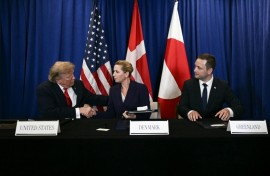 US President Donald Trump signs a security deal with Denmark's Prime Minister Mette Frederiksen and Greenland's Prime Minister Jens-Frederik Nielsen