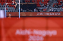 Japan's Misaki Morota on her way to women's pole vault gold on Friday, watched by a sparse crowd at the Mizuho Park Athletics Stadium in Nagoya