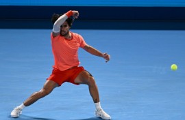 Spain's Carlos Alcaraz plays a shot to USA's Alex Michelsen during their men's singles tennis match at the ATP Tour Japan Open Tennis Championships at the Ariake Tennis Forest Park in Tokyo on October 1, 2026.