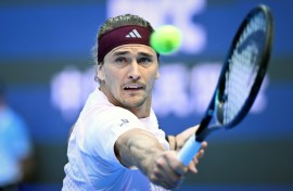 Germany's Alexander Zverev hits a return to Britain's Cameron Norrie during their men's singles first round tennis match at the China Open tennis tournament in Beijing on October 1, 2026.