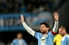 Lionel Messi celebrates scoring in his final international appearance for Argentina