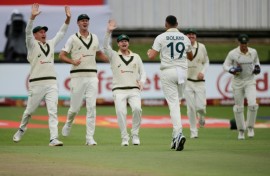 Scott Boland took two the only two wickets on a rain-shortened day after being recalled by Australia