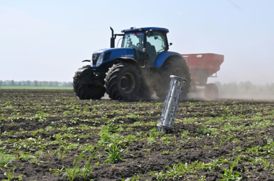 File: A tractor seen on a farm. AFP/Sergey Bobok
