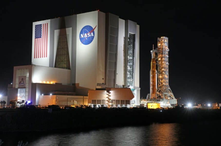 The Artemis-1 rocket is rolled out from the Vehicle Assembly Building en route to Launch Pad 39B at the Kennedy Space Center in Florida