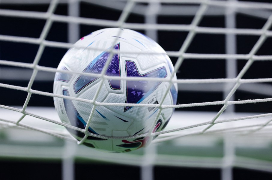 File: A soccer ball hitting a net. AFP/Fabrizio Carabelli/LiveMedia/NurPhoto