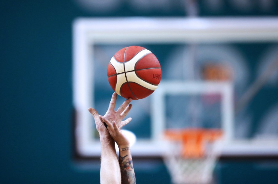 File: Two wheelchair basketball players try to get the ball. Felipe Poga/Photosport via AFP