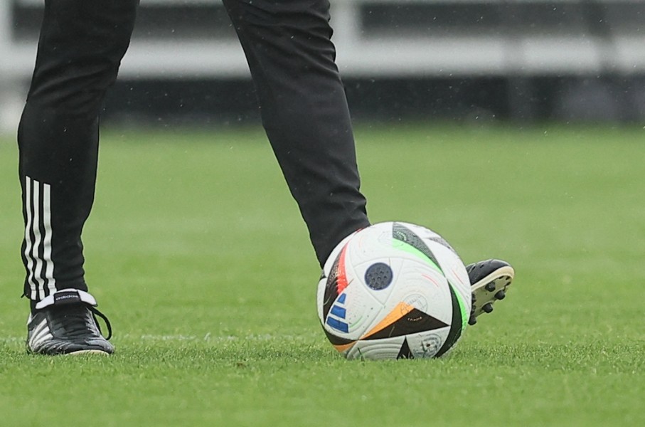 File: A soccer player practicing with a ball. AFP/Bruno Fahy/Belga Mag