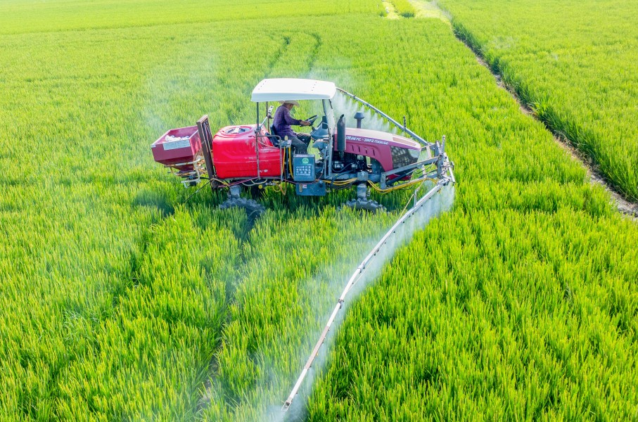 File: A farmer operating a vehicle to spray pesticides. Zhai Huiyong/Xinhua via AFP