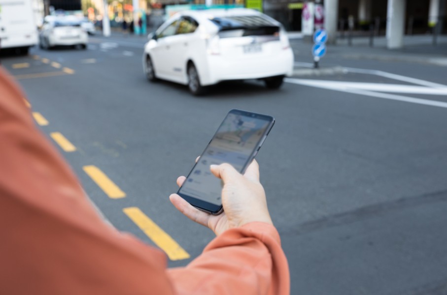 A person calling an e-hailing service