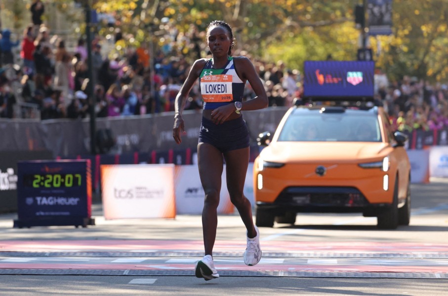 Kenyan Sharon Lokedi crosses the finish line to take second place in the New York Marathon in New York. AFP/Charly Triballeau