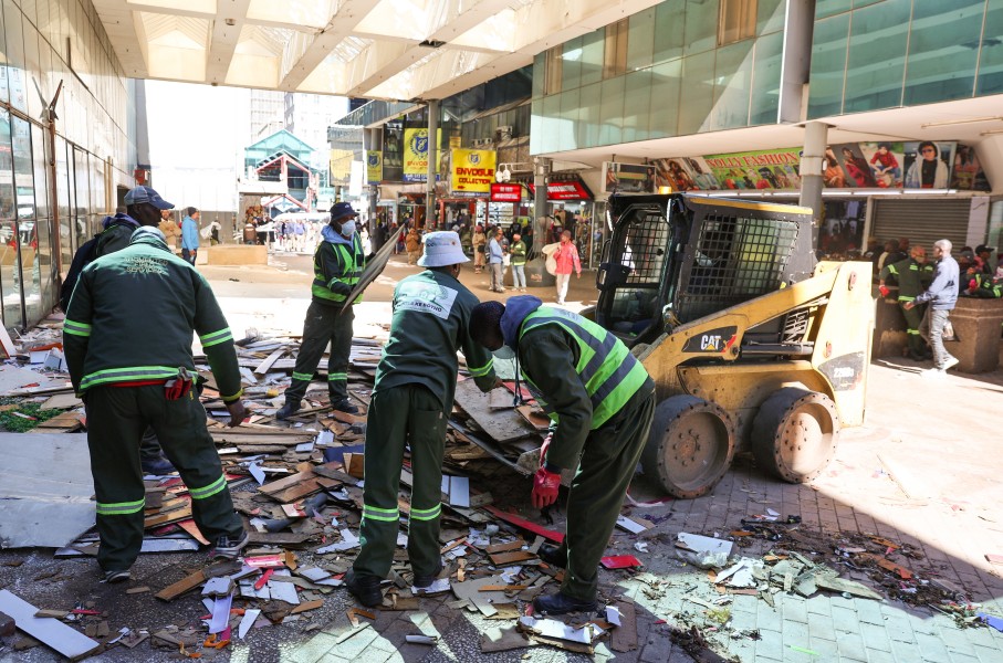 City Of Johannesburg officials work during a by-law enforcement operation to reclaim public spaces, restore law and order and remove illegal structures in the inner city. Gallo Images/Luba Lesolle