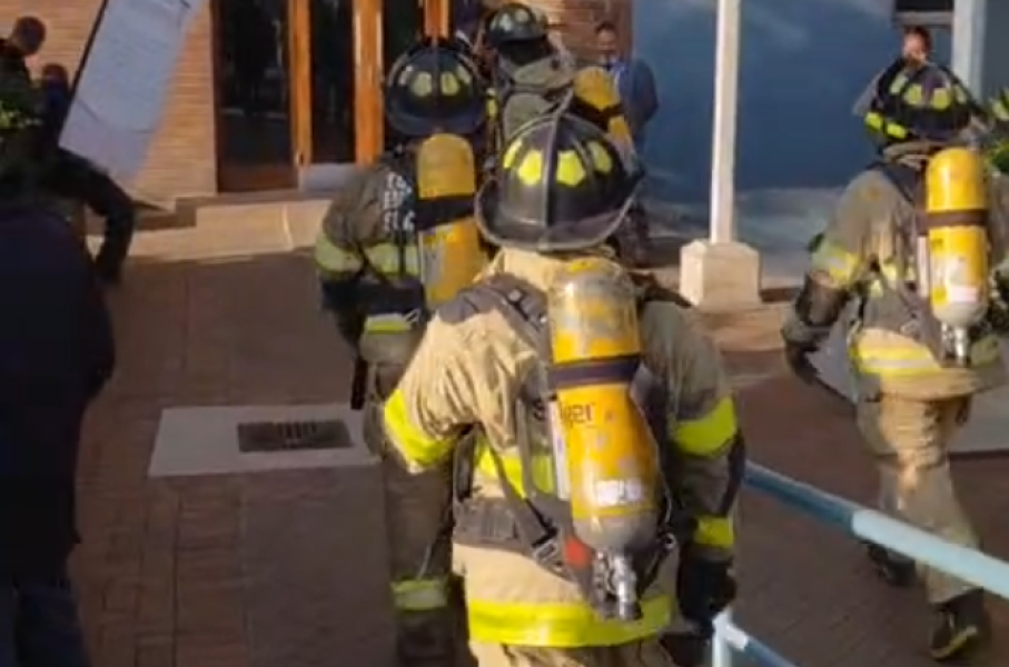 Firefighters on their way into the Madlanga Commission venue. eNCA