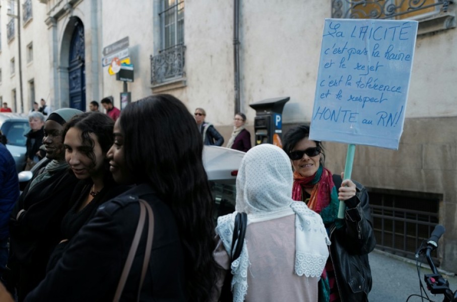 'Secularism is not hatred ': a protester in eastern France's Besancon in 2019
