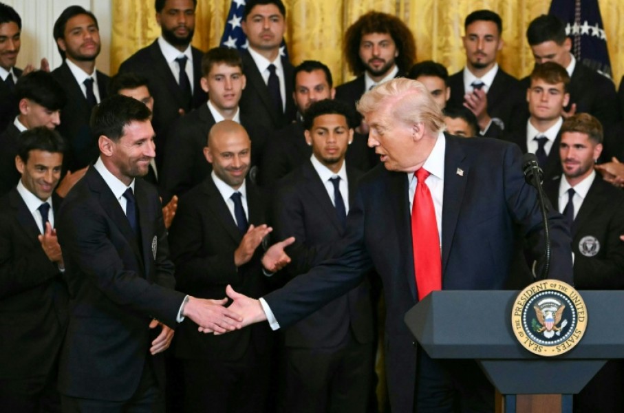 US President Donald Trump shakes hands with Inter Miami's Argentinian star Lionel Messi at an event honoring the club's 2025 MLS Cup title