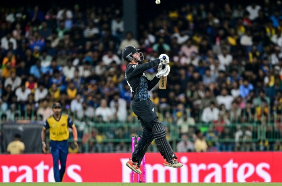 New Zealand's captain Mitchell Santner plays a shot at the World Cup