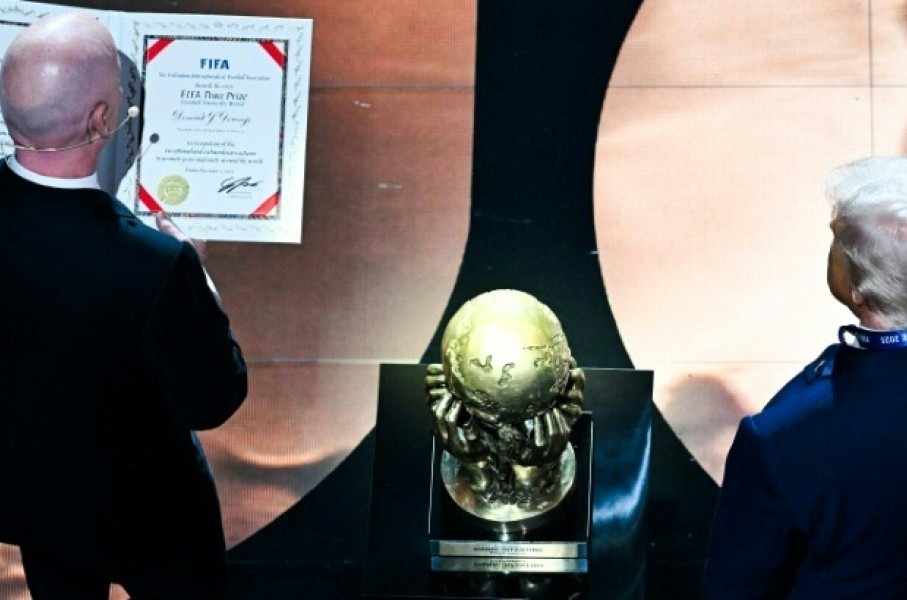FIFA President Gianni Infantino presents the newly-created FIFA Peace Prize to US President Donald Trump at the World Cup draw