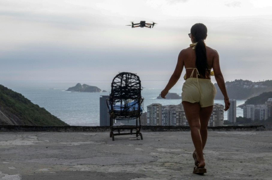 Set to an infectious beat, the video of the Rocinha favela has exploded on social media at a time when the city is drawing record tourists