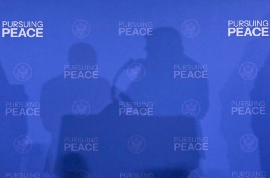 The shadows of US President Donald Trump and Russian President Vladimir Putin seen at their 2025 summit in Anchorage