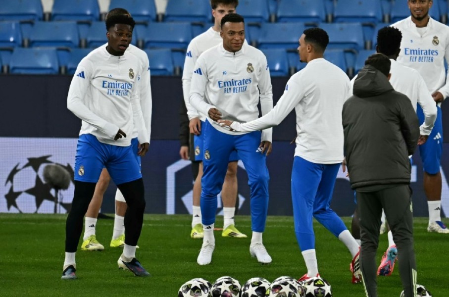 Real Madrid's Kylian Mbappe (C) is set to return to action against Manchester City