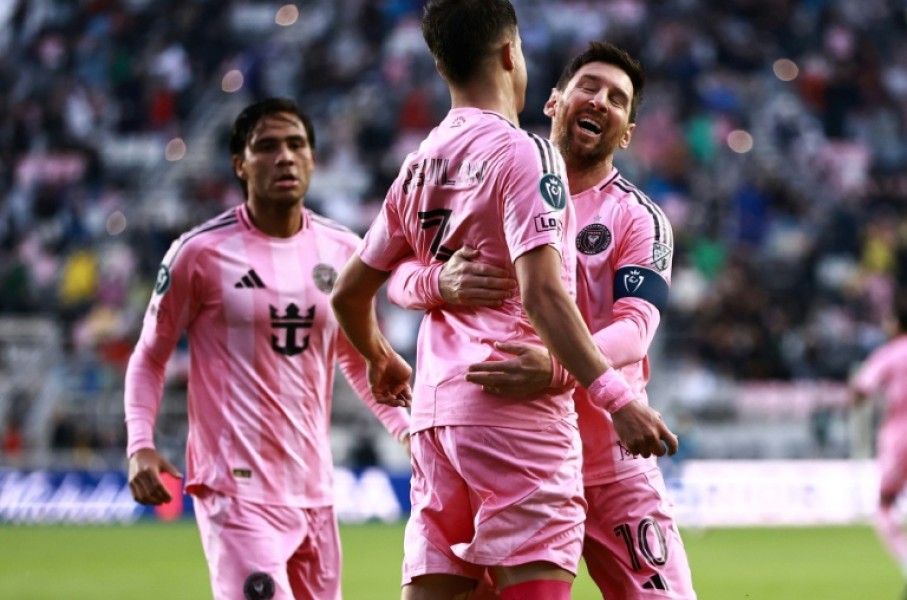 Lionel Messi celebrates after scoring the 900th goal of his career in Inter Miami's CONCACAF Champions Cup clash with Nashville
