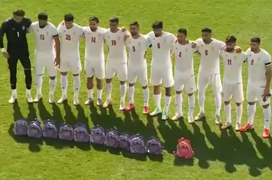 This video grab taken from images released by the Iranian state broadcaster (IRIB) on March 27, 2026 and released via AFPTV, shows the country's football national team paying tribute to the victims of the February 28 strike on an elementary school in Minab, ahead of their friendly football match with Nigeria in Turkey's Antalya
