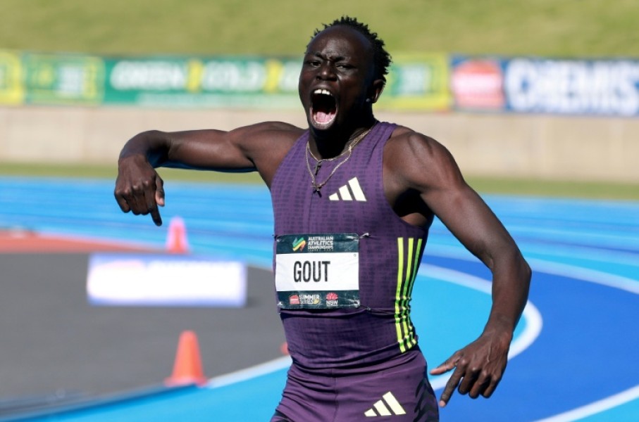 Gout Gout celebrates winning the 200m in 19.67 seconds at the Australian Athletics Championships in Sydney