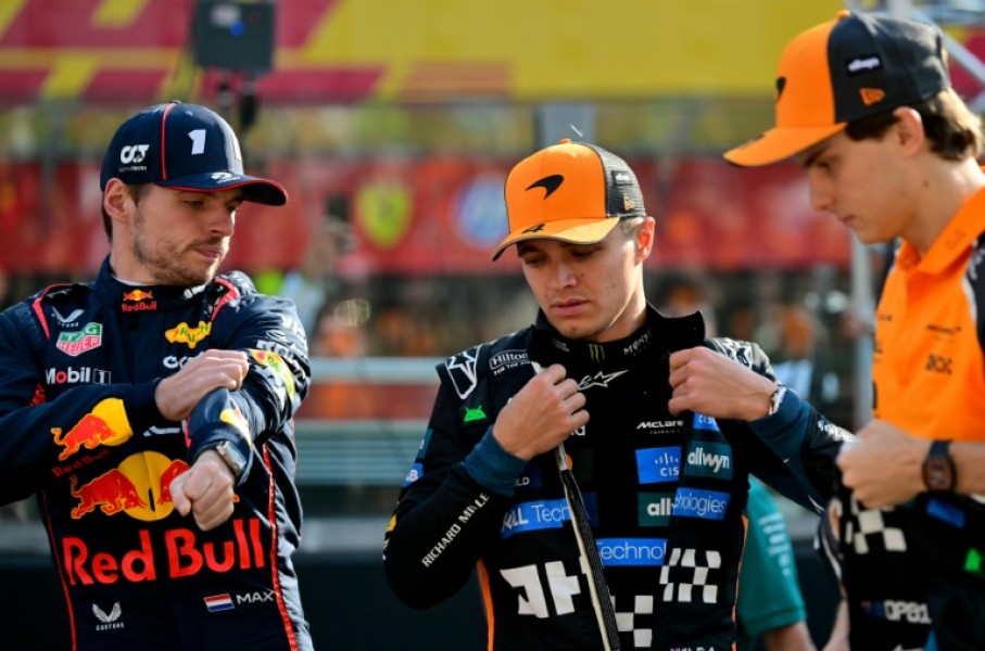 McLaren duo Lando Norris (C) and Oscar Piastri (R) feel F1 would be worse off if Max Verstappen were to walk away from the spot