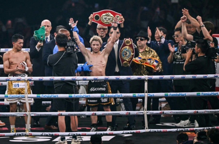 Japan's Naoya Inoue defeated Junto Nakatani by unanimous decision in their championship boxing bout to retain his undisputed super bantamweight titles at the Tokyo Dome