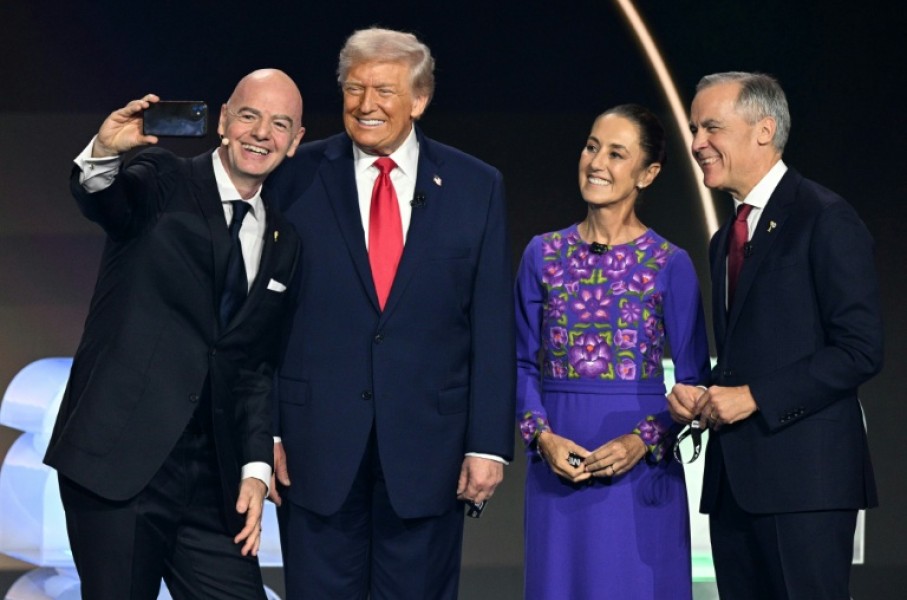 Fifa President Gianni Infantino, US President Donald Trump, Mexico's President Claudia Sheinbaum and Canada's Prime Minister Mark Carney at the draw for the 2026 World Cup