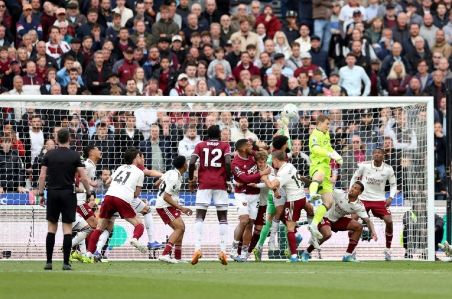 Arsenal goalkeeper David Raya reaches for the ball during a 1-0 Premier League win away to West Ham at the London Stadium