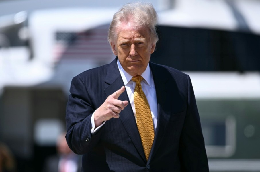 US President Donald Trump, pictured boarding Air Force One on May 12, 2026, notified Congress of strikes against Iran in early March